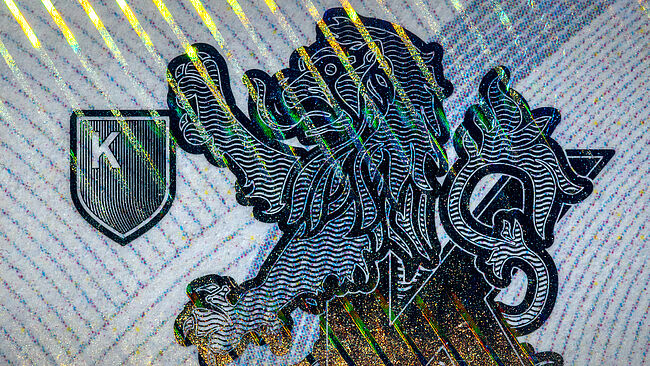 Close-up of the High Definition Metallization on a KINEGRAM sample overlay with uniquely thin lines and design possibilities