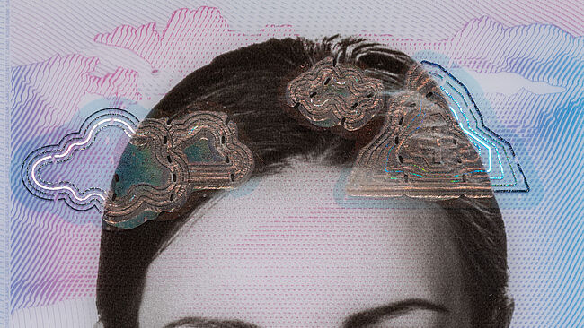 Image demonstrating that if standard laser equipment were to be used for personalization, the optical effects of the metallized lines would be destroyed.