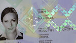 Close-up image of polycarbonate passport datapage with embedded KINEGRAM feature with Full Data Protection (FDP)