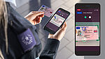 Image of an Officer using a smartphone to check and authenticate a KINEGRAM-secured ID card