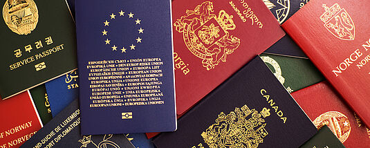 Updating Identity Documents for Robust Security and Standards Compliance The header image shows a collage of different international passports.
