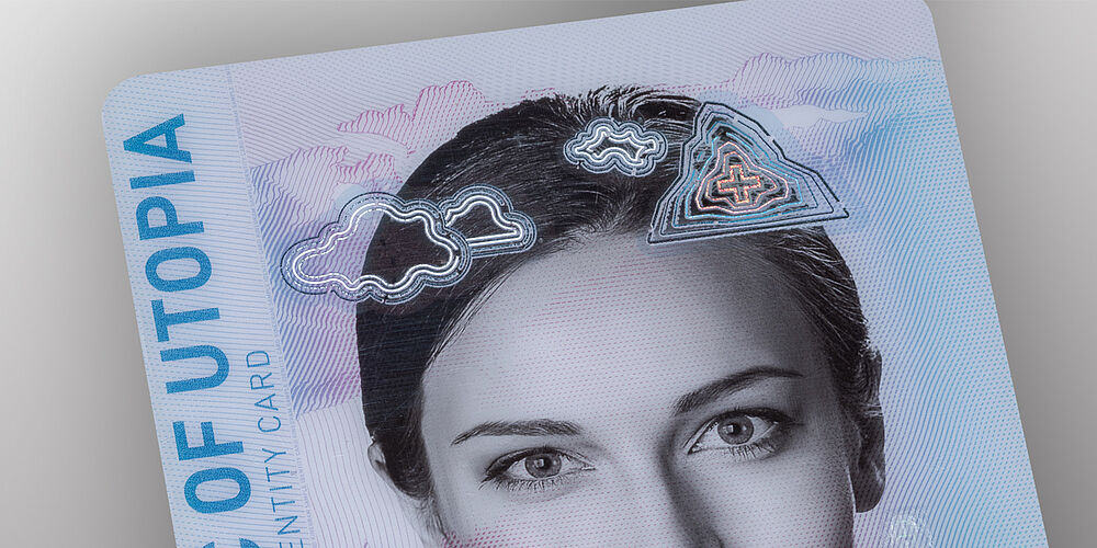 Enhanced photo protection through laserable KINEGRAM personalized with special laser equipment. Enhanced photo protection through laserable KINEGRAM personalized with special laser equipment.