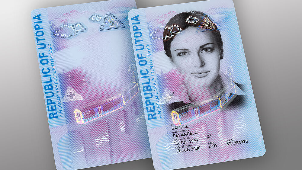 "An Amazing Journey" the new KINEGRAM sample ID card in portrait format. Both the personalization and the portrait are optimally protected with a highly sophisticated KINEGRAM PCI with FDP feature. "An Amazing Journey" the new KINEGRAM sample ID card in portrait format. Both the personalization and the portrait are optimally protected with a highly sophisticated KINEGRAM PCI with FDP feature.